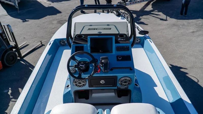  Yacht Photos Pics 2025 SCB S22 boat dashboard with steering wheel and controls, featuring a modern design.