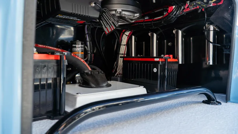  Yacht Photos Pics 2025 SCB S22 vehicle battery compartment with wiring and components.