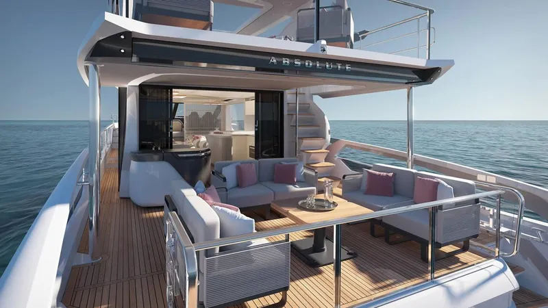  Yacht Photos Pics Luxurious 2026 Absolute 70 Fly yacht with elegant outdoor seating and ocean view.