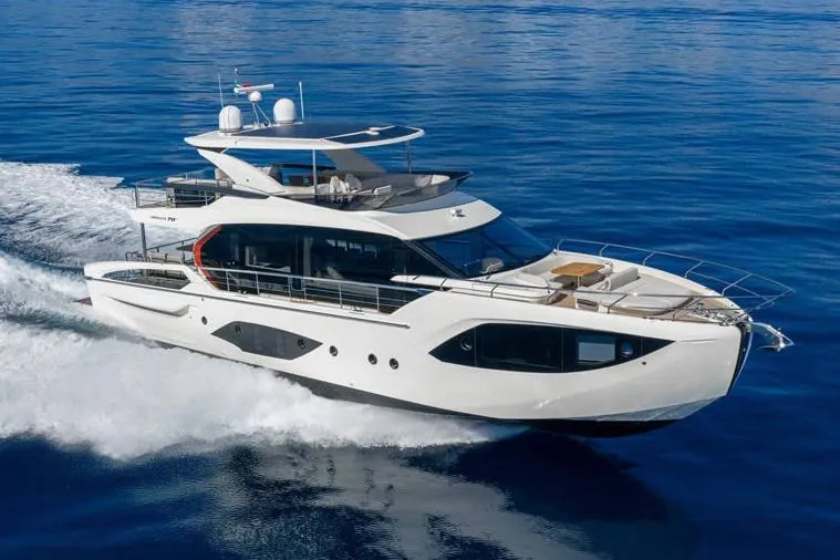  Yacht Photos Pics Luxury Absolute 70 Fly yacht cruising on open sea, 2026 model.