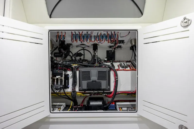  Yacht Photos Pics Electrical panel inside 2026 Front Runner 39 Center Console boat, showcasing wiring and components.