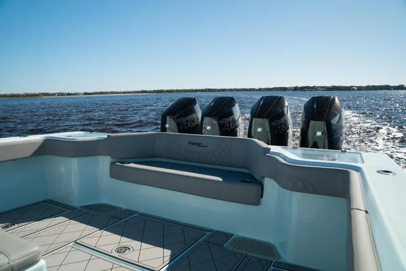  Yacht Photos Pics 2026 Front Runner 39 Center Console boat with four powerful engines on open water.