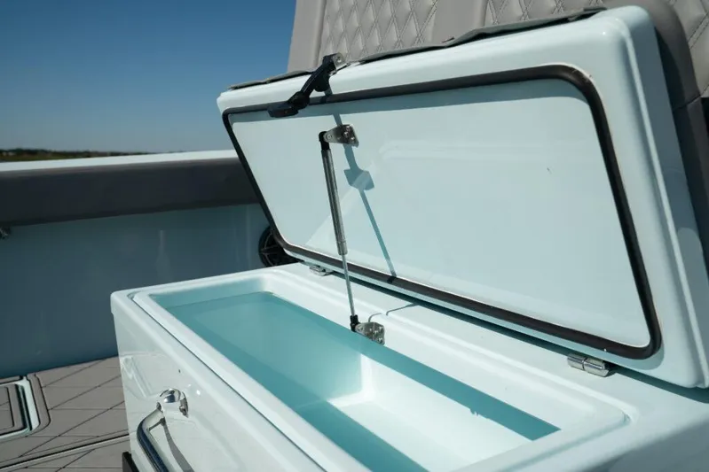  Yacht Photos Pics Open storage compartment on 2026 Front Runner 39 Center Console boat, showcasing interior design.