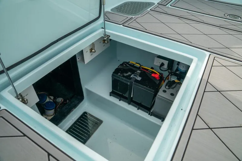  Yacht Photos Pics 2026 Front Runner 39 Center Console boat battery compartment with wiring and components.