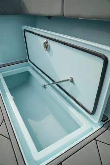  Yacht Photos Pics 2026 Front Runner 39 Center Console storage compartment with open lid, showcasing interior design.