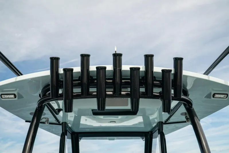  Yacht Photos Pics 2026 Front Runner 39 Center Console boat with rod holders against a blue sky.