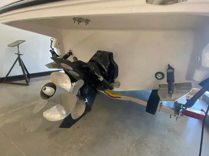  Yacht Photos Pics 2023 Monterey 298 SUPER SPORT BR boat propeller and stern view in a showroom.