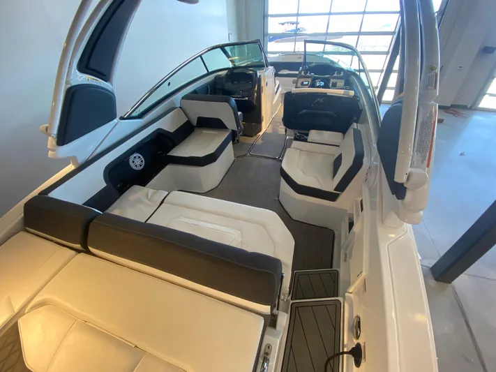  Yacht Photos Pics 2023 Monterey 298 Super Sport BR interior with sleek seating and modern dashboard.