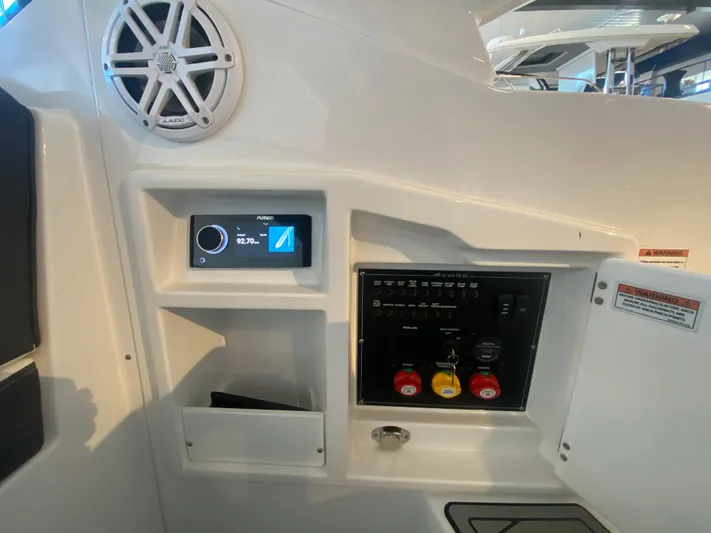  Yacht Photos Pics Control panel of 2023 Monterey 298 SUPER SPORT BR boat with speaker and display.