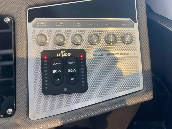  Yacht Photos Pics Control panel of 2023 Monterey 298 SUPER SPORT BR boat with Lenco trim tab switches.