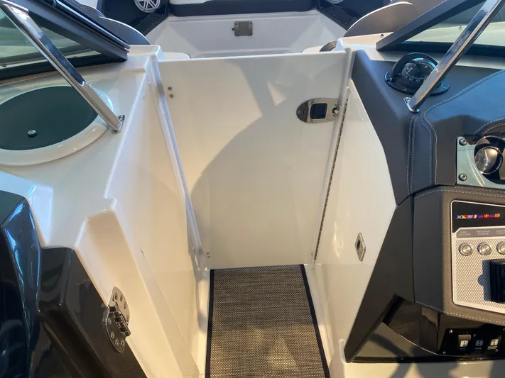  Yacht Photos Pics 2023 Monterey 298 SUPER SPORT BR boat interior with sleek dashboard and modern controls.