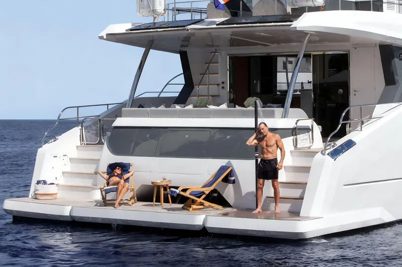 Oceanwalker - Electric - S60e Yacht Photos Pics Luxury Oceanwalker S60e yacht with sunbathing and showering on deck, 2026 model.