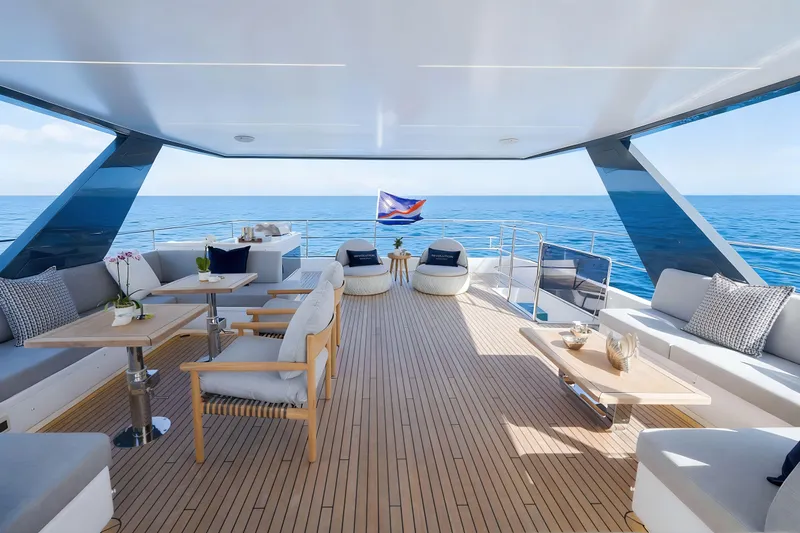 Oceanwalker - Electric - S60e Yacht Photos Pics Luxurious Oceanwalker S60e electric yacht deck with elegant seating and ocean view, 2026 model.