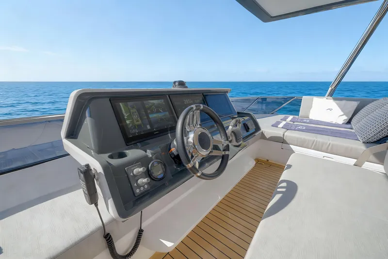 Oceanwalker - Electric - S60e Yacht Photos Pics Helm of 2026 Oceanwalker S60e Electric yacht with ocean view and modern controls.