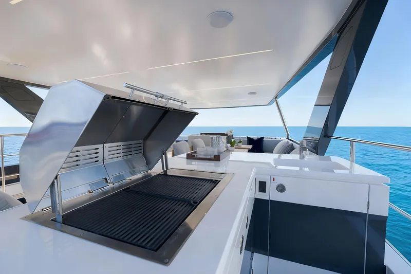 Oceanwalker - Electric - S60e Yacht Photos Pics Luxury Oceanwalker S60e yacht with outdoor grill and ocean view, 2026 model.