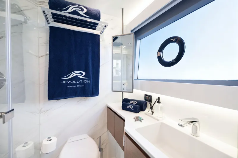 Oceanwalker - Electric - S60e Yacht Photos Pics Luxurious bathroom in 2026 Oceanwalker S60e yacht with modern fixtures and ocean view.