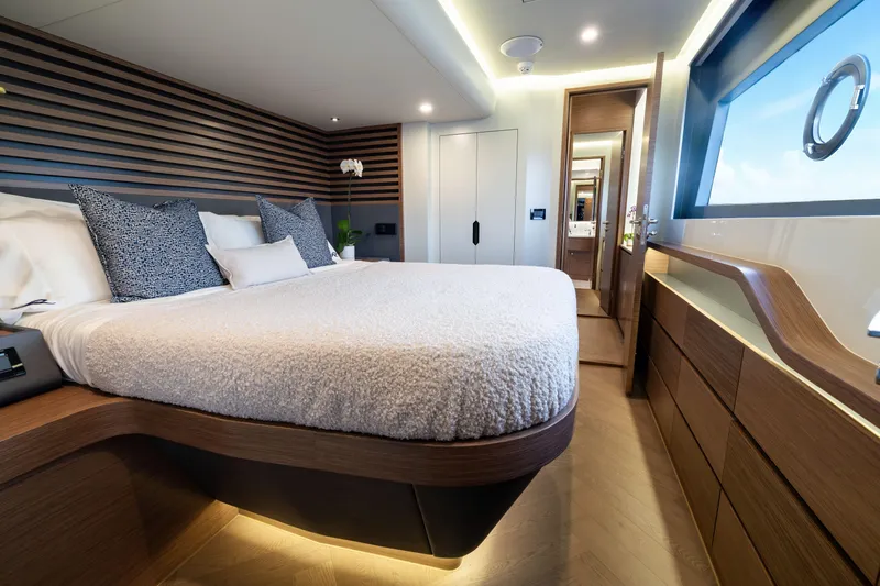 Oceanwalker - Electric - S60e Yacht Photos Pics Luxurious bedroom interior of 2026 Oceanwalker S60e Electric yacht, featuring modern design and elegant furnishings.
