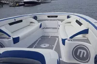 2018 Mystic Powerboats M4200 on water, featuring spacious seating and sleek design.