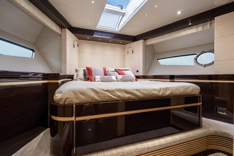 Yolo Yacht Photos Pics Luxurious bedroom interior of 2014 Sunseeker Predator yacht with skylight and modern design.