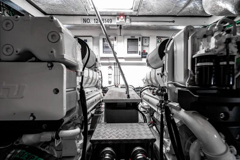 Yolo Yacht Photos Pics Engine room of a 2014 Sunseeker Predator yacht with twin engines.