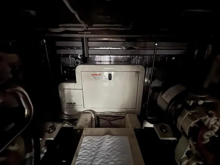 Beautiful Crazy Yacht Photos Pics Engine room of 2003 Carver 570 Voyager Pilothouse with Kohler power system.