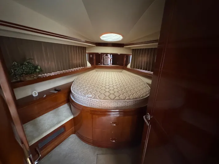Beautiful Crazy Yacht Photos Pics Luxurious bedroom interior of 2003 Carver 570 Voyager Pilothouse yacht with elegant wood finish.