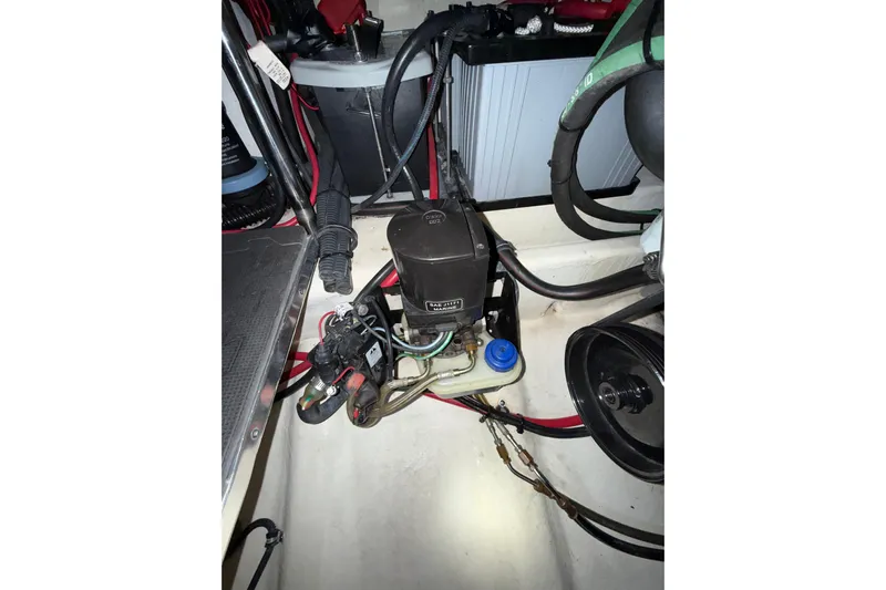  Yacht Photos Pics Engine compartment of a 2004 Formula 34 Performance Cruiser, showcasing wiring and components.