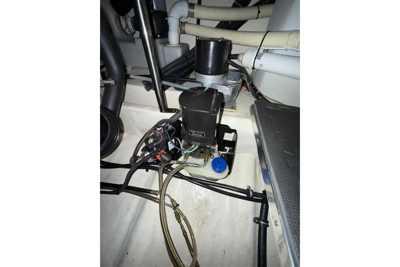  Yacht Photos Pics Engine compartment of a 2004 Formula 34 Performance Cruiser with visible wiring and components.