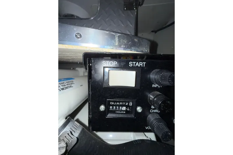  Yacht Photos Pics Control panel of a 2004 Formula 34 Performance Cruiser with hour meter display.