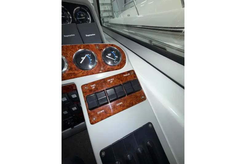  Yacht Photos Pics 2004 Formula 34 Performance Cruiser dashboard with gauges and control switches.