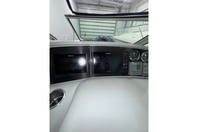  Yacht Photos Pics 2004 Formula 34 Performance Cruiser dashboard with navigation screens and gauges.