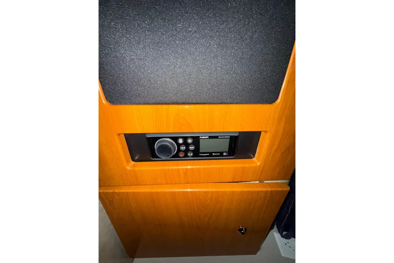  Yacht Photos Pics 2004 Formula 34 Performance Cruiser interior with Fusion audio system.