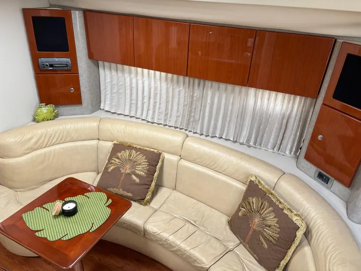 Cookin' Yacht Photos Pics Luxurious interior of a 2008 Formula 37 PC yacht with leather seating and wood accents.