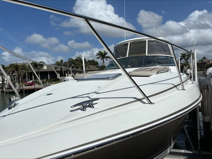 Cookin' Yacht Photos Pics 2008 Formula 37 PC yacht docked under a clear blue sky.
