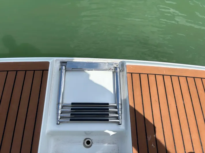 Cookin' Yacht Photos Pics 2008 Formula 37 PC swim platform with retractable ladder and teak decking.