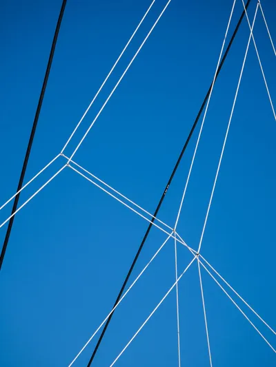 Duolife Yacht Photos Pics Sailboat rigging against a clear blue sky, Lagoon 620 Essence, 2019 model.