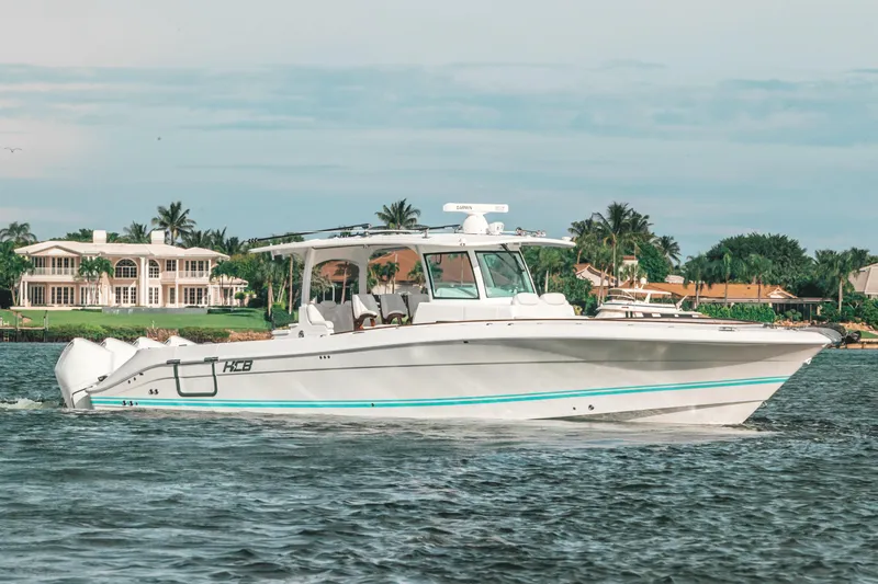  Yacht Photos Pics 2021 HCB 42 Lujo boat cruising on a scenic waterway.