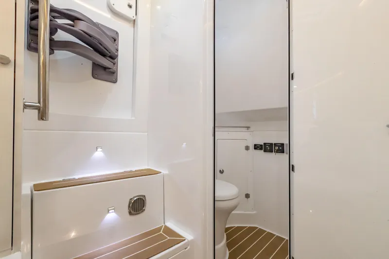  Yacht Photos Pics 2021 HCB 42 Lujo boat interior bathroom with modern fixtures and wood accents.