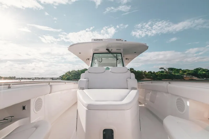  Yacht Photos Pics 2021 HCB 42 Lujo boat with sleek design, open deck, and clear sky backdrop.