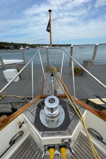 Meritage Yacht Photos Pics Bow view of 1990 Grand Banks 42 Classic yacht docked at a marina.
