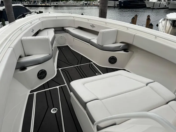 Re-powered-2022 Yacht Photos Pics 2019 Fountain 38 CC boat interior with sleek seating and modern design.