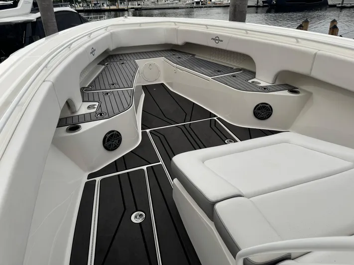 Re-powered-2022 Yacht Photos Pics 2019 Fountain 38 CC boat interior with sleek seating and modern design.