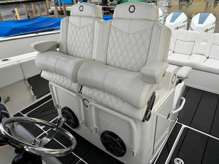 Re-powered-2022 Yacht Photos Pics Luxurious seating on 2019 Fountain 38 CC boat with diamond-stitched upholstery.