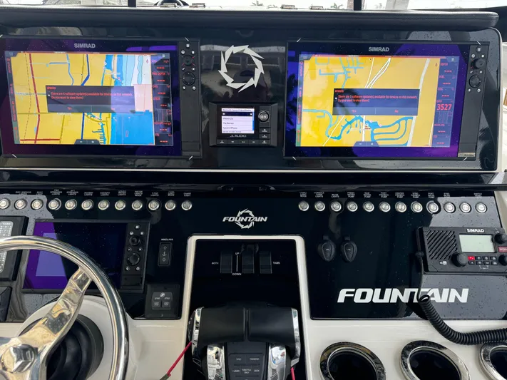 Re-powered-2022 Yacht Photos Pics 2019 Fountain 38 CC boat dashboard with dual Simrad navigation screens.