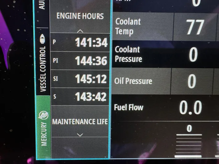 Re-powered-2022 Yacht Photos Pics Boat engine display showing hours, coolant temperature, and pressures for 2019 Fountain 38 CC.