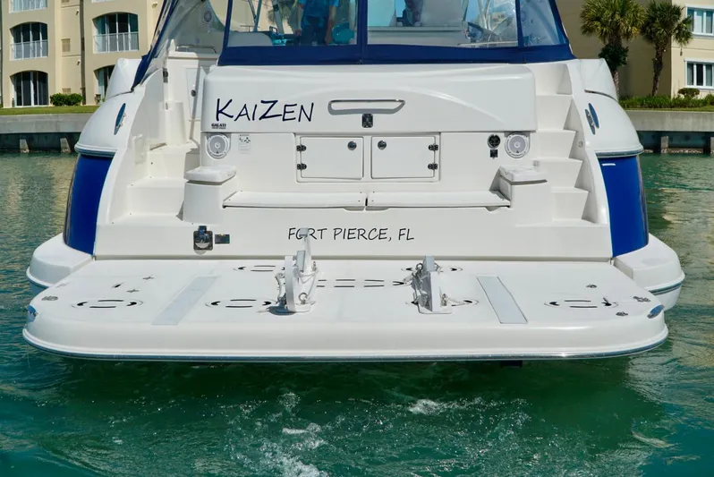 Kaizen Yacht Photos Pics 2007 Cruisers Yachts 560 Express, rear view, docked in Fort Pierce, FL.