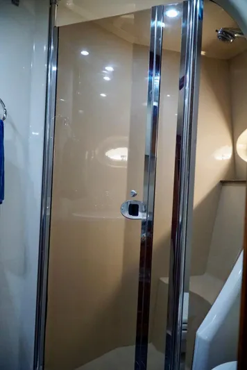 Kaizen Yacht Photos Pics 2007 Cruisers Yachts 560 Express bathroom with glass shower door