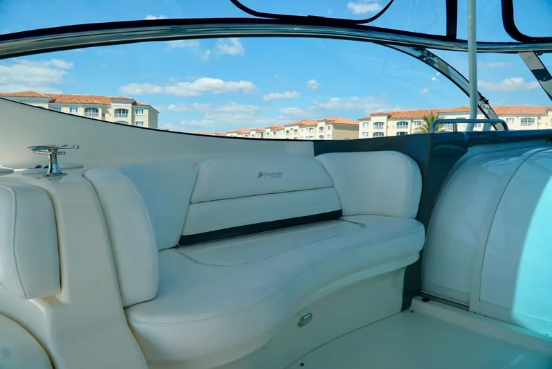 Kaizen Yacht Photos Pics 2007 Cruisers Yachts 560 Express interior with white seating and scenic view.