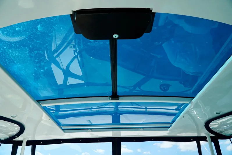 Kaizen Yacht Photos Pics 2007 Cruisers Yachts 560 Express blue-tinted sunroof.