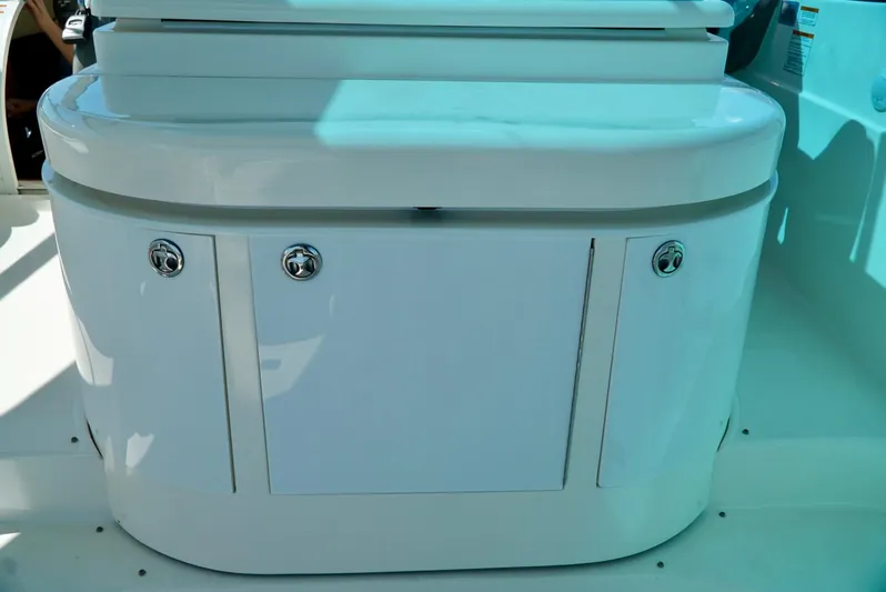 Kaizen Yacht Photos Pics 2007 Cruisers Yachts 560 Express cockpit storage compartment.